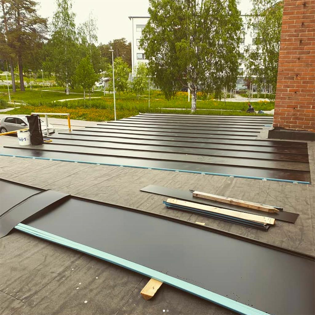 Bandtäckning och takbyte i Holmsund